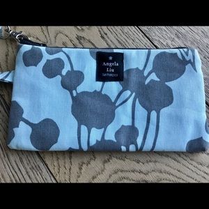 Botanic wristlet, blue with gray print. New